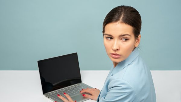 Women looking concerned away from computer representing the right to be forgotten