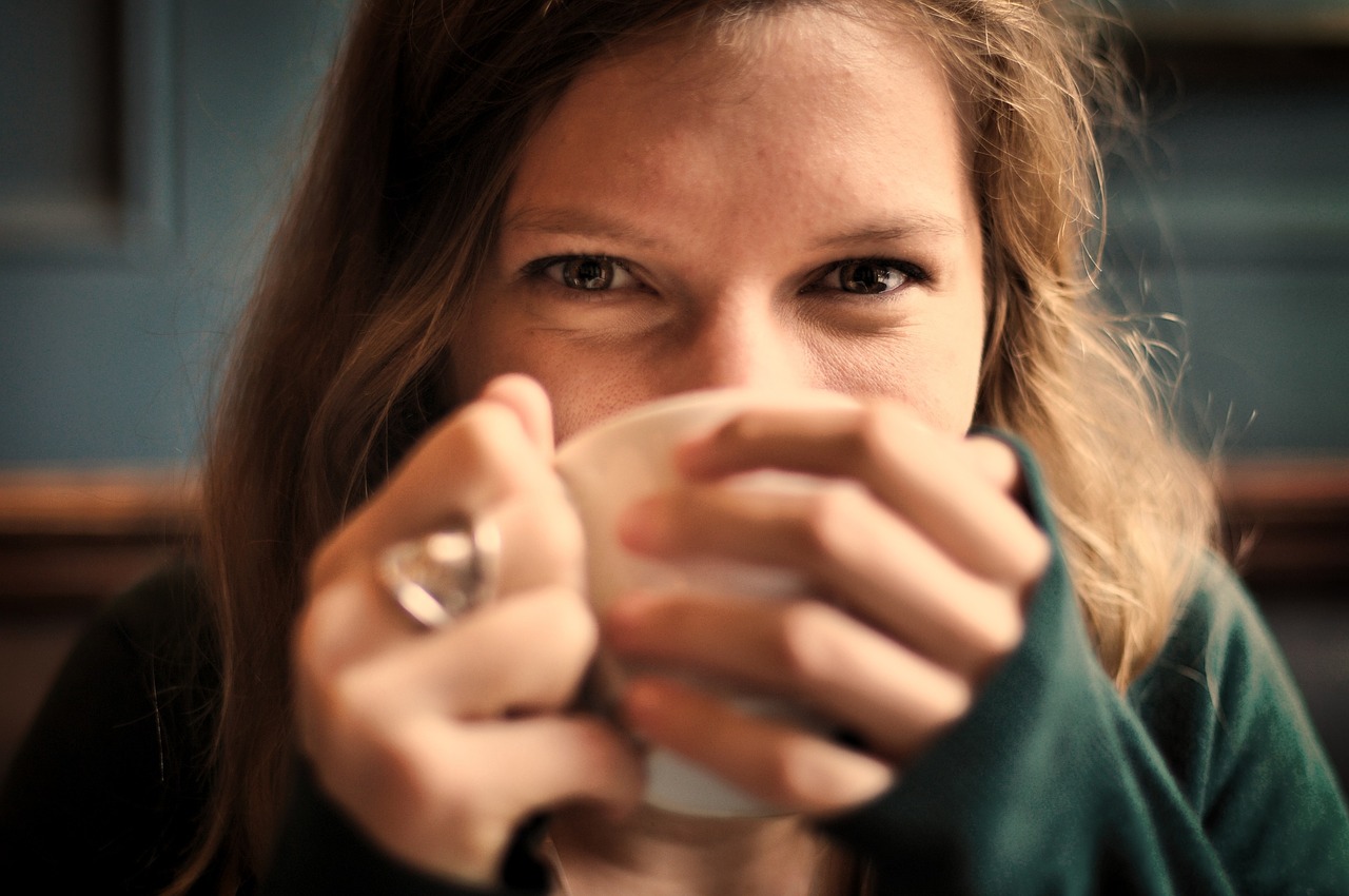 girl drinking cup tea