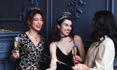 Three women celebrating new years in spite of not keeping their resolutions.