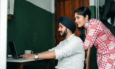 Young couple working on startup together.