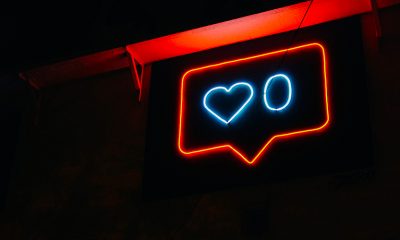 Neon social media like heart with a 0