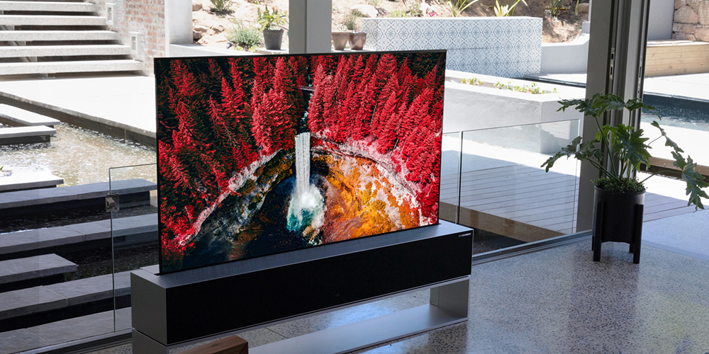 LG's rollable TV on display in a minimalist living room.