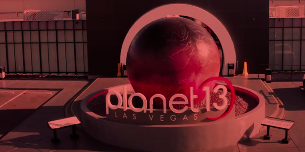 Exterior of Planet 13 building with red filter.