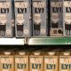 Plant-based milk Oatly on store shelves, two different varieties.