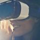 Woman wearing a VR headset in warm sunny lighting, PTSD patients treatment