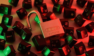 Lock in computer keys representing cyberwarfare, cyber attacks, and threats against Cybersecurity..