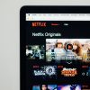 Netflix homepage representing their partnership with Microsoft for new ad tier.