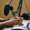 Person recording podcast