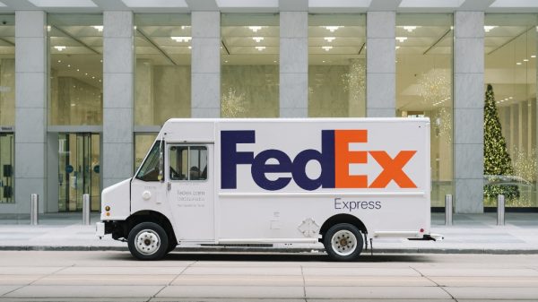 fedex express truck in front of post office