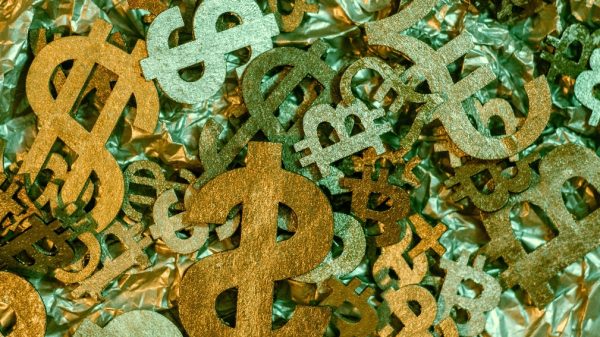 money, bitcoin, and ethereum signs representing crypto.com