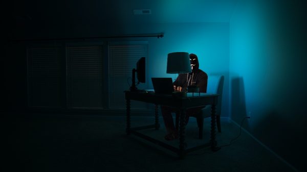 hackers in the dark on computer
