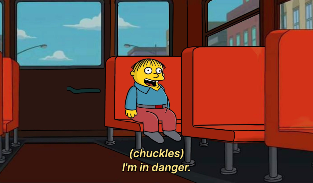 Simpsons meme saying "I'm in danger" while riding bus, representing overseas chip production that could affect safety.