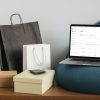 iorders on macbook with shopping bags